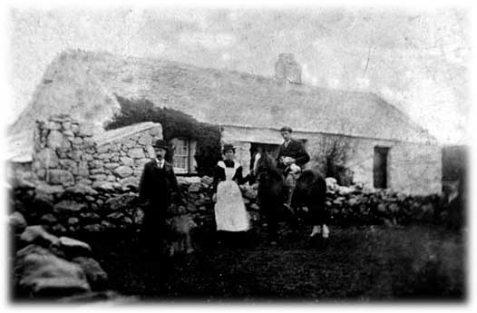 William Pritchard and Wife Rachel Jones standing outside Neuadd ddu cottage