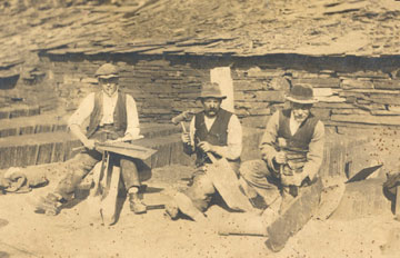 Three quarrymen working in one of the Nantlle Valley's slate quarries (circa 1890)